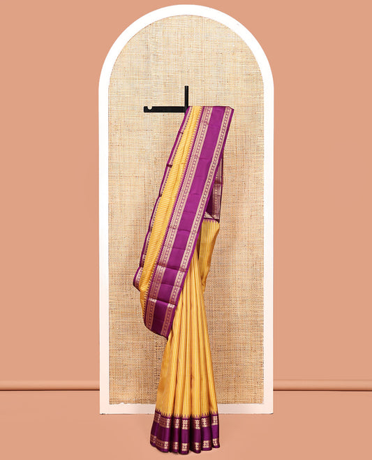 Yellow Kanchipuram Silk Saree, Masterfully Woven with Kasa-Kasa Checks, Contrast Rettai Pettu Border of Thazampoo Rekku, Salngai, Kathir, and Kamalam, Striped Pallu, and a Contrast Blouse