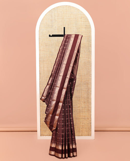 Maroon Kanchipuram Silk Saree, Detailed with Buttas and Checks, a Zari Rettai Pettu Border of Thazampoo Rekku, and Mayil Designs, Grand Pallu, and a Matching Blouse