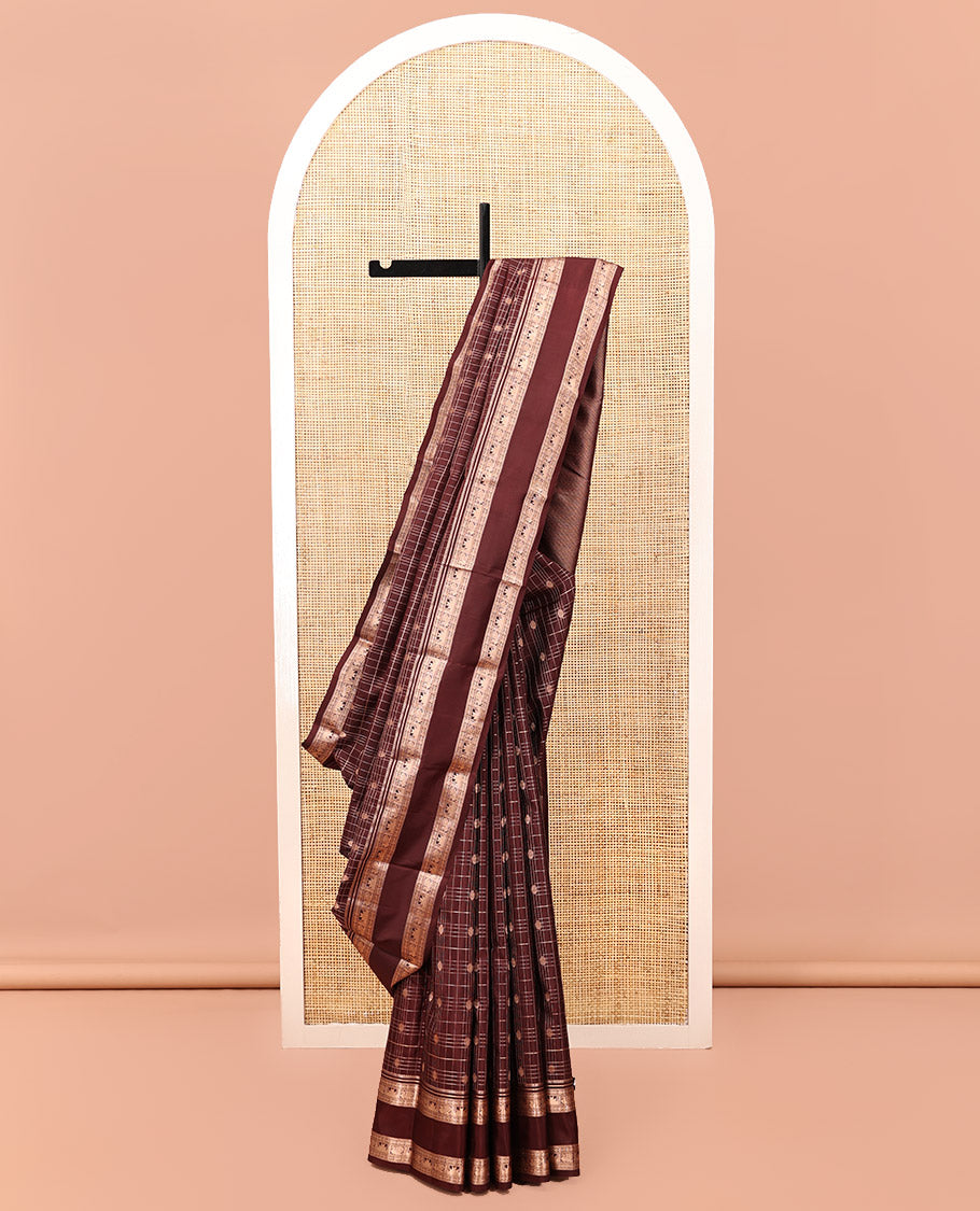 Maroon Kanchipuram Silk Saree, Detailed with Buttas and Checks, a Zari Rettai Pettu Border of Thazampoo Rekku, and Mayil Designs, Grand Pallu, and a Matching Blouse