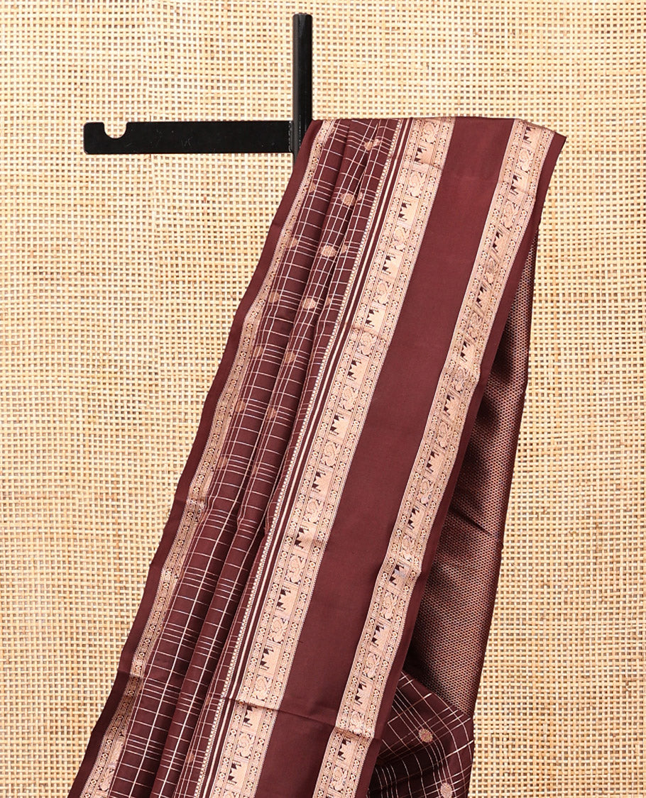 Maroon Kanchipuram Silk Saree, Detailed with Buttas and Checks, a Zari Rettai Pettu Border of Thazampoo Rekku, and Mayil Designs, Grand Pallu, and a Matching Blouse