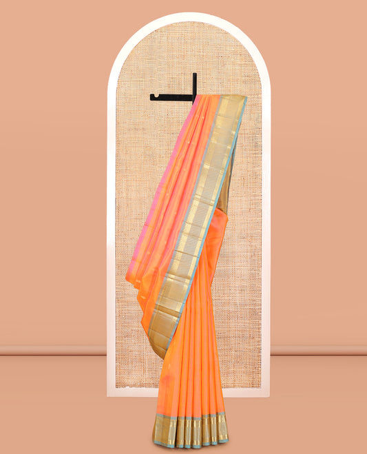 Orange Kanchipuram Silk Saree, Bedecked with Zari Buttas, Complemented by a Contrast Border of Rekku, Mayil Kann, and Muthu Design, Pallu of Zari Design, and No Blouse