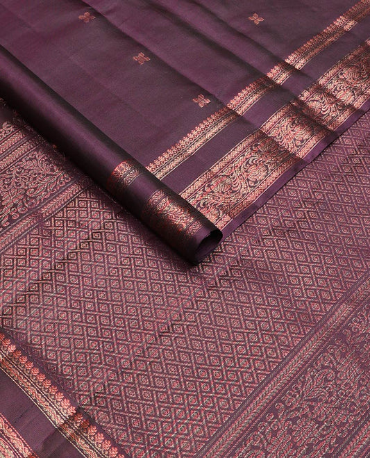Eggplant purple zari buttas soft silk saree, rettai pettu border of thilakam mokku, neli, and kodi visiry designs, and geometric patterned pallu