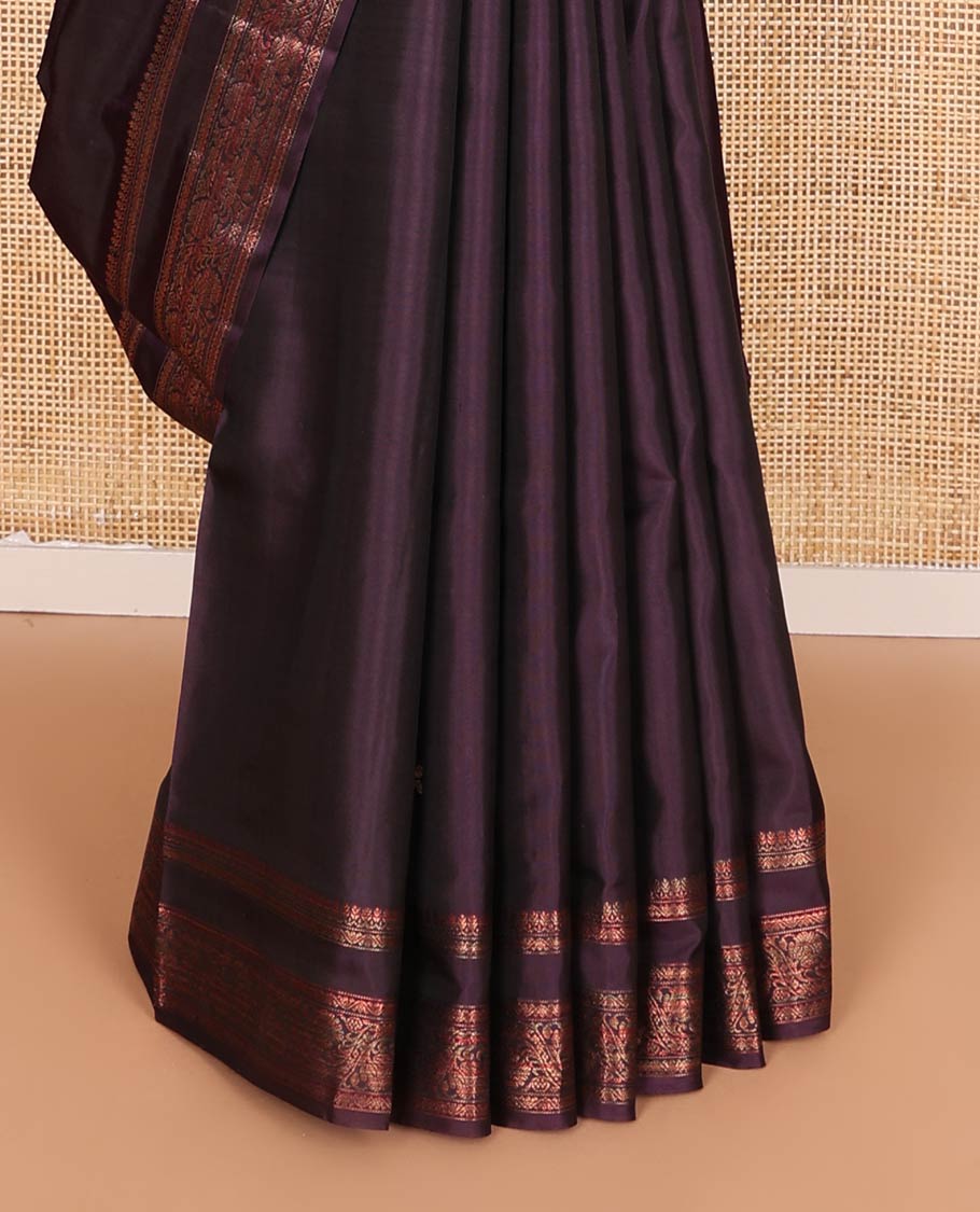 Eggplant purple zari buttas soft silk saree, rettai pettu border of thilakam mokku, neli, and kodi visiry designs, and geometric patterned pallu