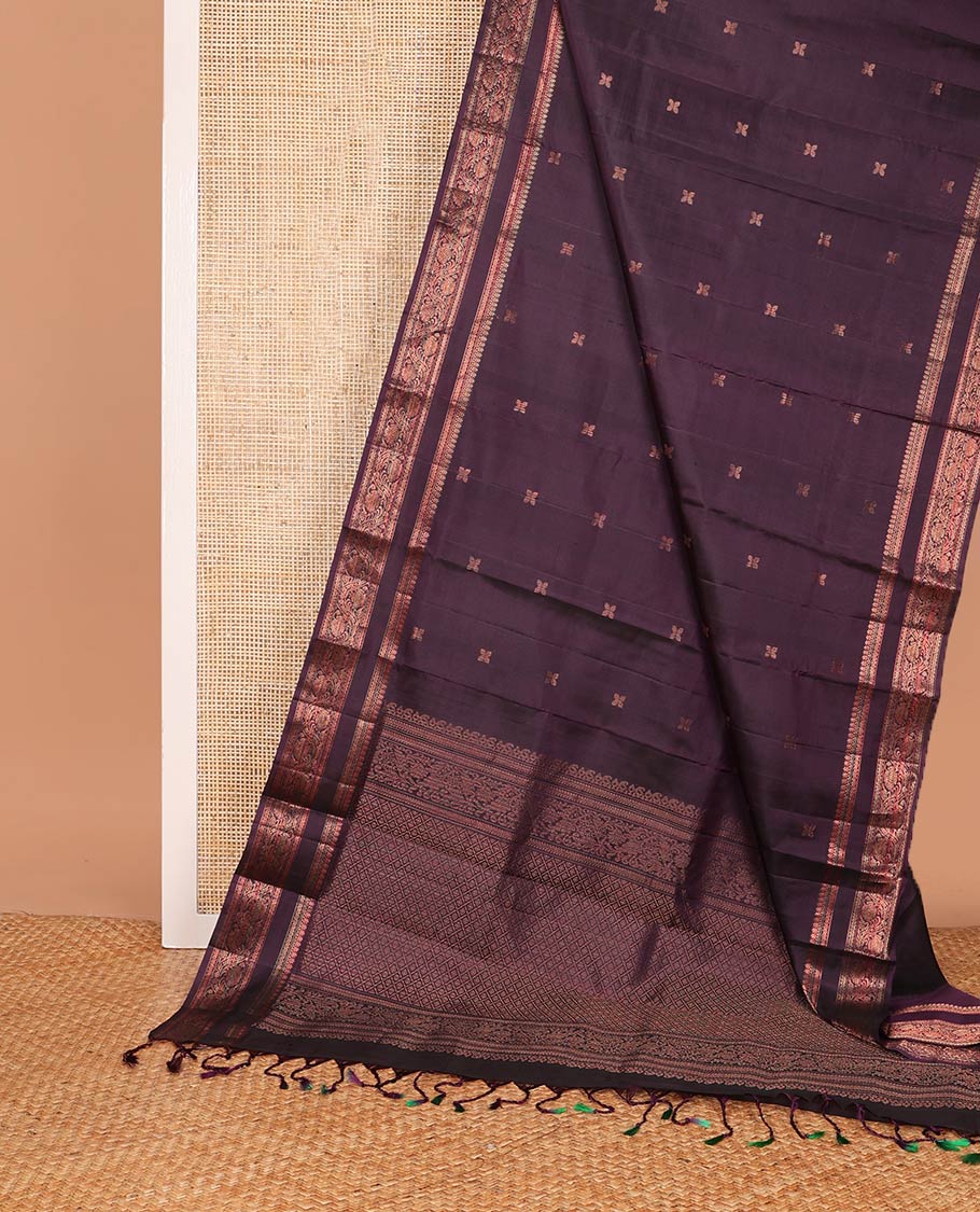 Eggplant purple zari buttas soft silk saree, rettai pettu border of thilakam mokku, neli, and kodi visiry designs, and geometric patterned pallu
