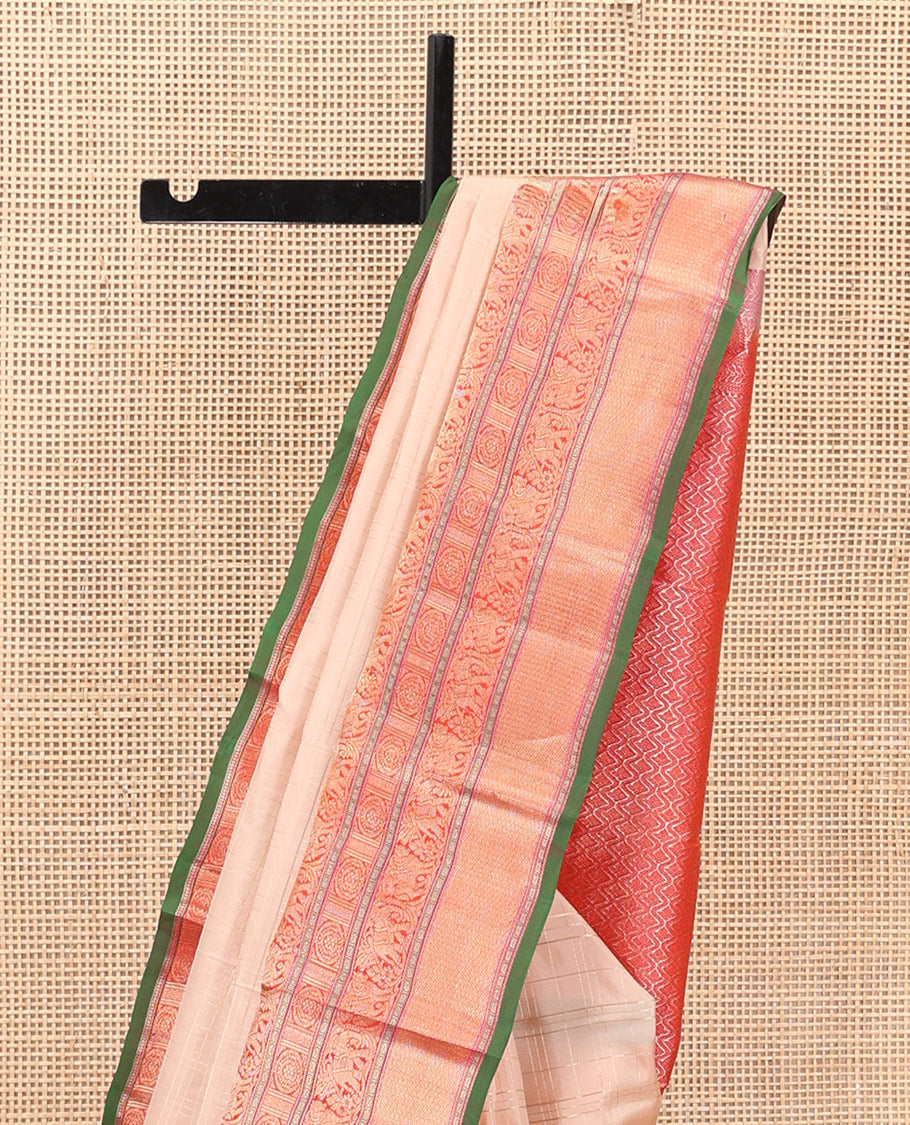 Sandal Vasundhara Silk Saree Subtly Sparkled with Zari Checks, Complemented by a Contrast Border of Thilakam Mokku, Chakram, Kodi Yaanai, Kuthirai, and Mayil Kann, Intricately Designed Pallu, and Paired with a Contrast Blouse