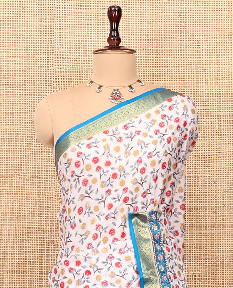 Cream Printed Silk Saree Adorned with a Floral Print, Contrast Traditional Zari Border, Striped Pallu, and Contrast Blouse