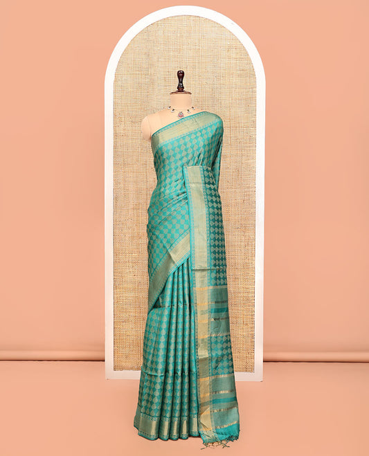 Green Tussar Silk Saree, Adorned with Buttas, a Subtle Border, Pallu of Stripes and Buttas, and a Matching Blouse