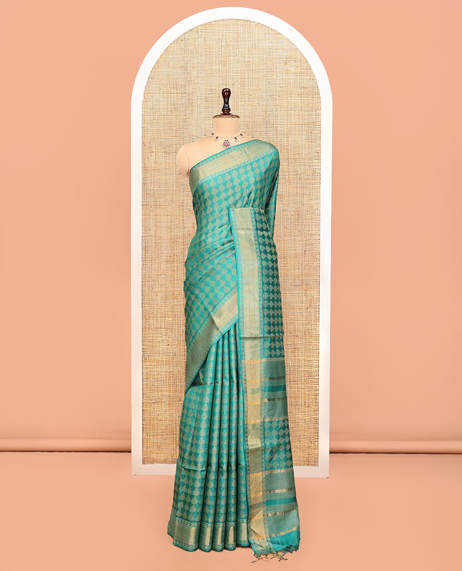 Green Tussar Silk Saree, Adorned with Buttas, a Subtle Border, Pallu of Stripes and Buttas, and a Matching Blouse