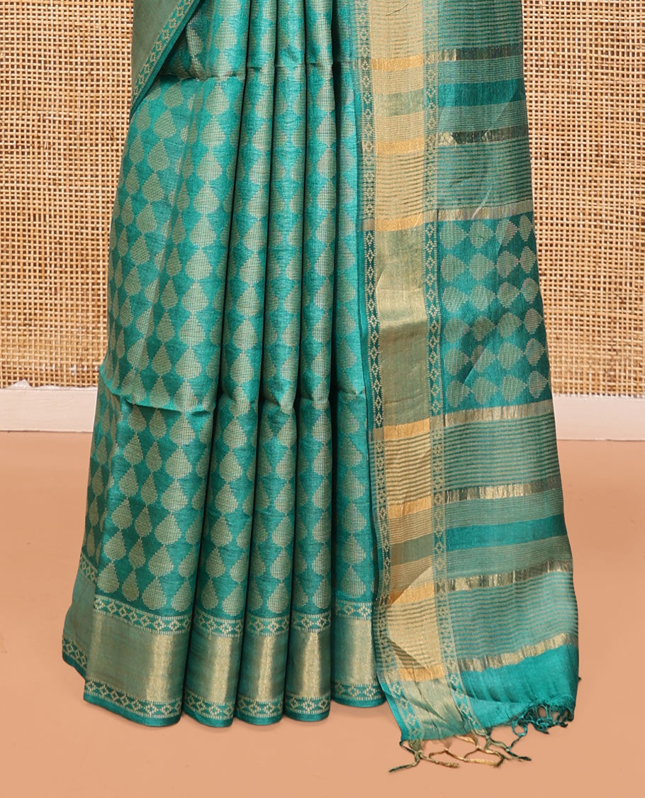 Green Tussar Silk Saree, Adorned with Buttas, a Subtle Border, Pallu of Stripes and Buttas, and a Matching Blouse