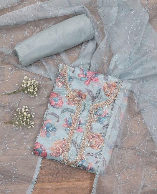 Grey Material Chudidar Set, Beautifully Bedecked with Floral Print, and Outline Embroidery on Organza Top, a Plain Santoon Bottom, and Paired with a Floral Vine Sequins Embroidered Organza Dupatta