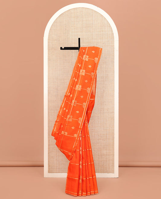 Orange Venkatagiri Silk Saree, Spotlighted with Zari Buttas Enclosed Checks All Over Its Body, Highlighted by Zari Temple Border, Pallu Features Floral and Bird Designs, and Paired with a Matching Blouse