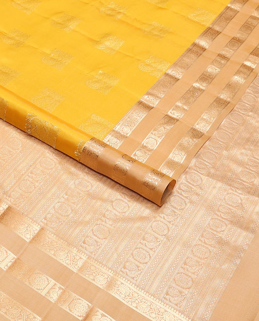 Yellow geometric design vasundhara elite silk saree with contrast rettai pettu zari design border & intricate zari design pallu