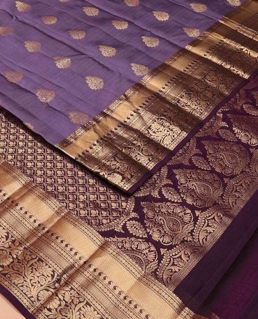 Violet Vasundhara Lite Silk Mix Saree Elegantly Framed with Floral Zari Buttas, Adorned with a Contrast Border Featuring Kamalam, Paisa, Manga, Then Kuli Kann, and Kodi Visiry Designs, Pallu Elevated with Intricate Designs, and a Contrast Blouse