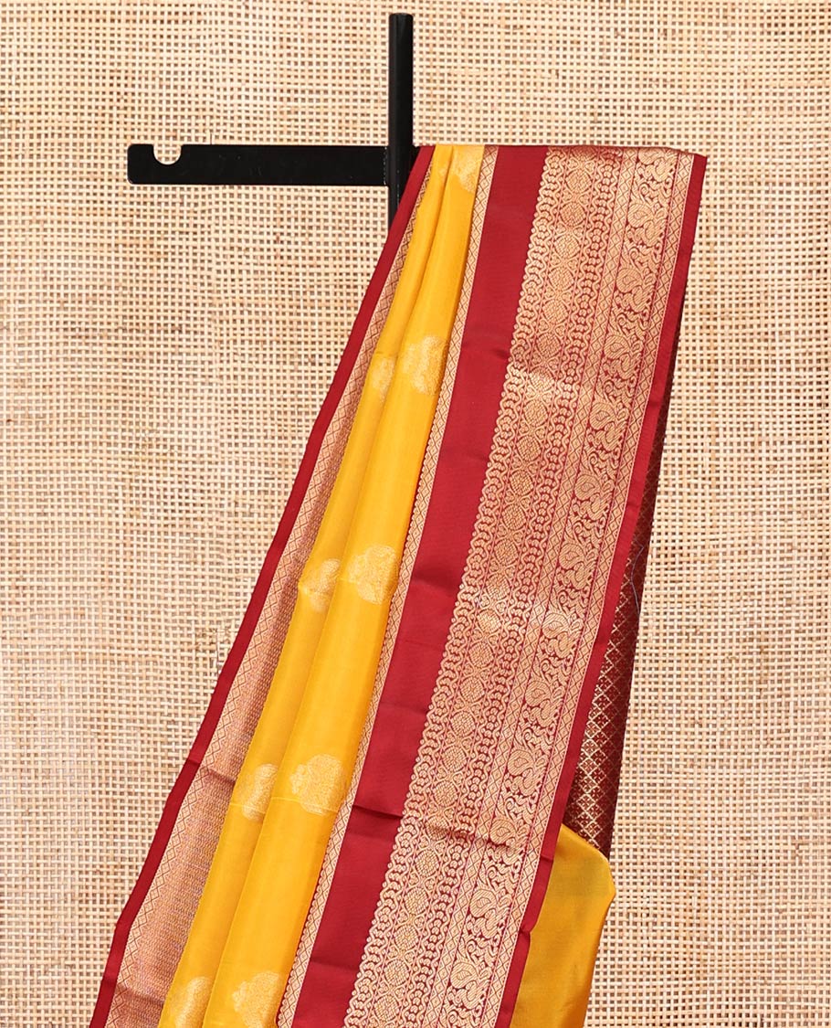 Yellow Vasundhara Lite Silk Mix Saree, Subtly Woven with Iruthalai Pakshi Buttas All Over Its Body, Complemented by Contrast Rettai Pettu Border of Rekku, Diamond, Neli, Laddu Kamalam, and Mayil Designs, Grand Jaal Pallu and Paired with a Contrast Blouse