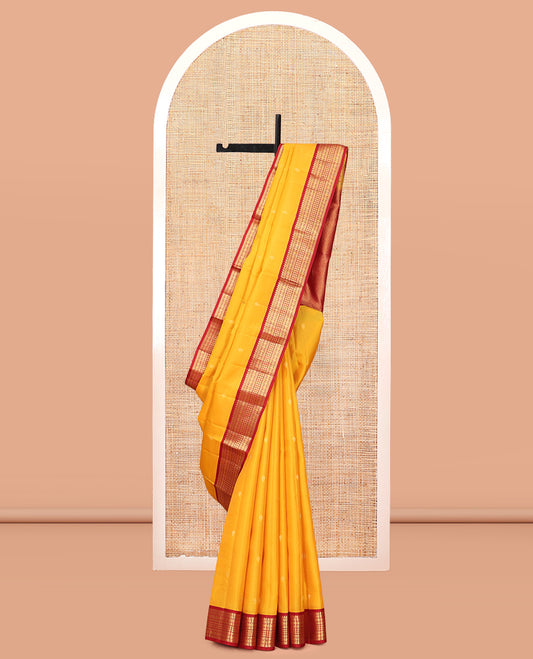 Yellow Vasundhara Lite Silk Mix Saree Features Zari Buttas, a Contrast Border of Thilakam Mokku, Muthu, Banaras, Rudraksham, and Neli Designs, Jaal Pallu, and a Contrast Blouse