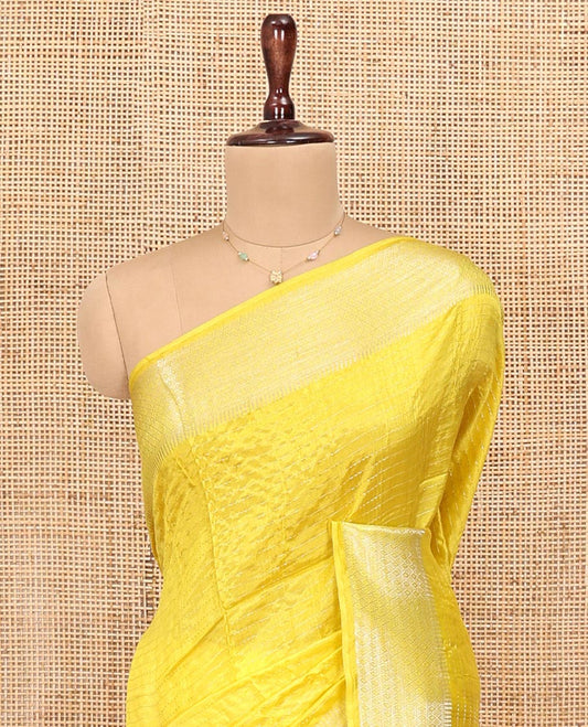Yellow Banana Pith Saree, Subtly Sparkled with Zari Stripes All Over Its Body, Subtly Woven Border, Subtly Striped Pallu, and Paired with a Matching Blouse