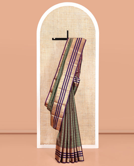Green Vasundhara Silk Saree, Meticulously Crafted with Zari Butta Enclosed Checks All Over Its Body, Complemented by a Contrast Border of Mayil, Kuthirai, and Yaanai Designs, Grand Jaal Pallu, and Paired with a Contrast Blouse