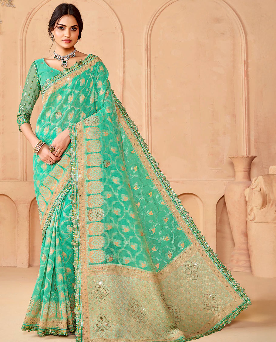 Turquoise jaal and micro-stone work designer saree, paisleys embroidered scallop border, and  pallu of ogee patterns and stone work