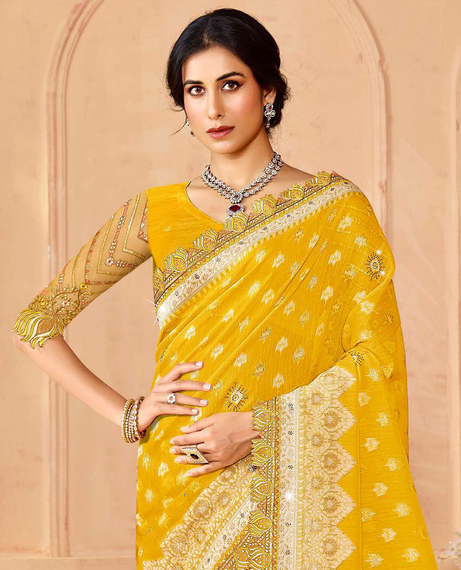 Yellow buttas & stone work dola silk saree, lotus motif patch embroidery border & intricately woven stonework pallu