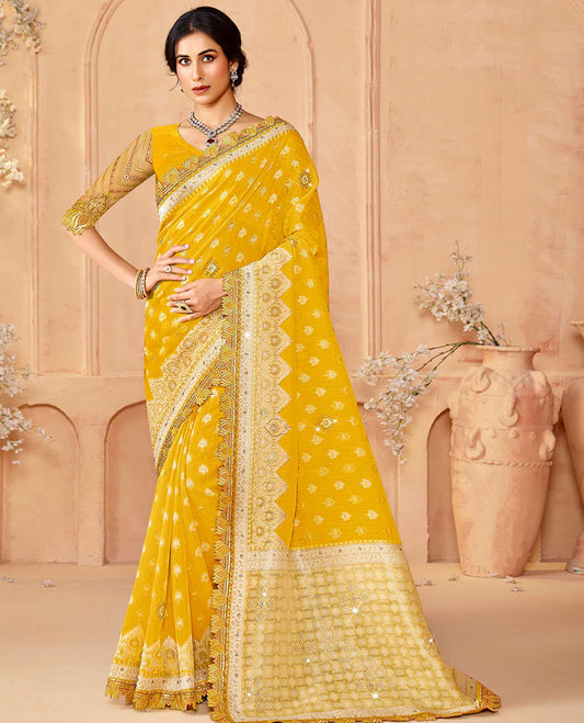 Yellow buttas & stone work dola silk saree, lotus motif patch embroidery border & intricately woven stonework pallu