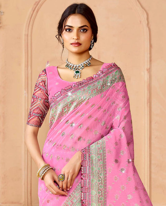 Pink buttas and micro-stone work designer saree, scallop embroidered border, and pallu of leaf patterns and stone work
