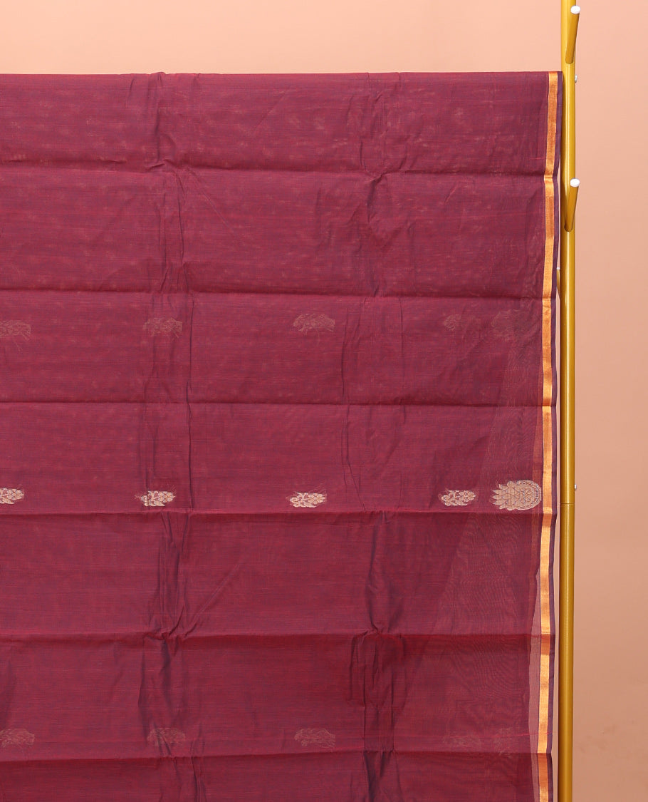 Wine Kanchi Cotton Saree, Elevated with Buttas on Its Body, a Subtle Border, Intricately Designed Pallu, and a Matching Blouse