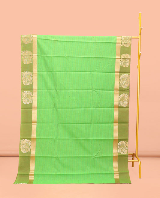 Green Semi-Silk Cotton Saree, Subtly Sparkled with Stripes All Over Its Body, Complemented by a Contrast Zari Buttas Woven Border, Pallu of Bird and Paisley Designs, and Paired with a Matching Blouse