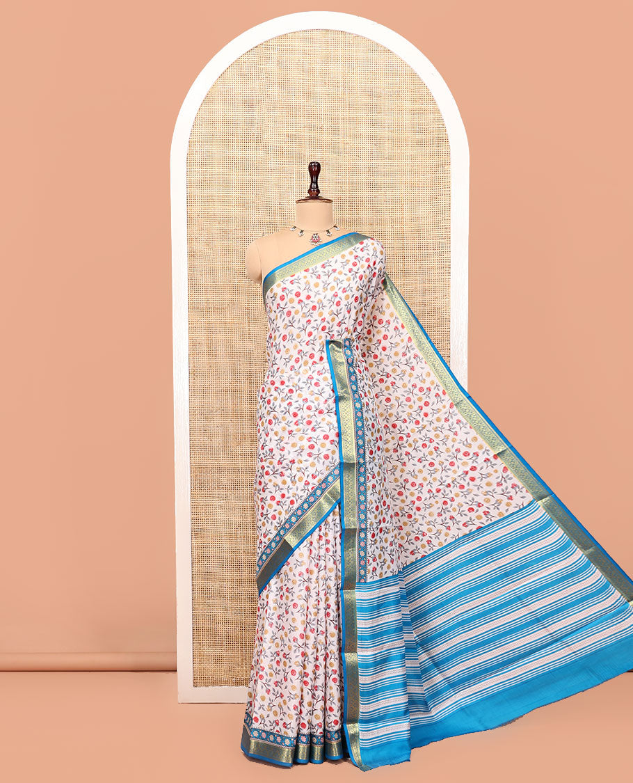 Cream Printed Silk Saree Adorned with a Floral Print, Contrast Traditional Zari Border, Striped Pallu, and Contrast Blouse
