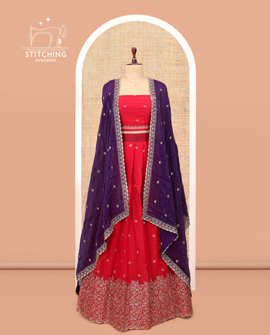 Red Banarasi Half-Saree, Gracefully Embellished with Buttas Embroidered Skirt, Floral Embroidered Border, Matching Blouse, and Contrast Embroidered Scallop Dupatta