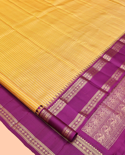 Yellow Kanchipuram Silk Saree, Masterfully Woven with Kasa-Kasa Checks, Contrast Rettai Pettu Border of Thazampoo Rekku, Salngai, Kathir, and Kamalam, Striped Pallu, and a Contrast Blouse