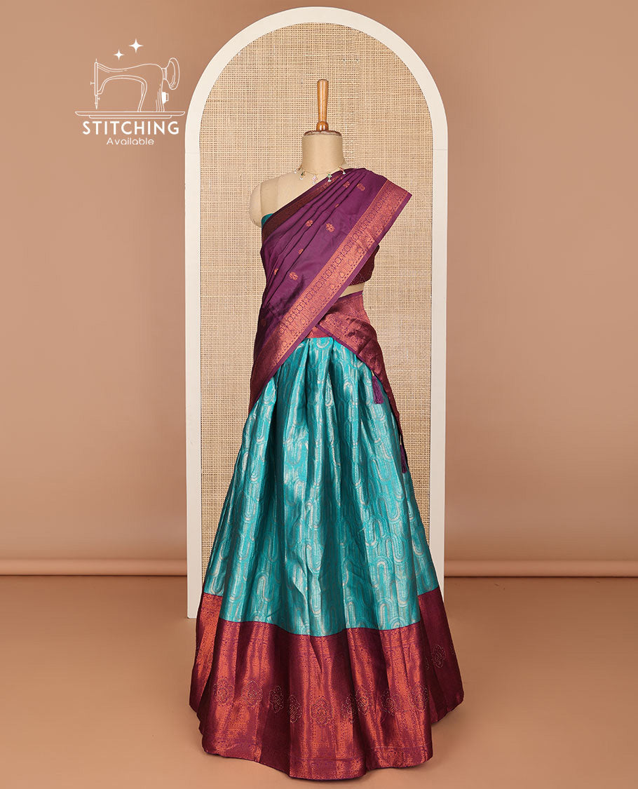 Light blue floral buttas half saree with contrast intricate zari design border, zari design blouse & floral zari design dhavavni