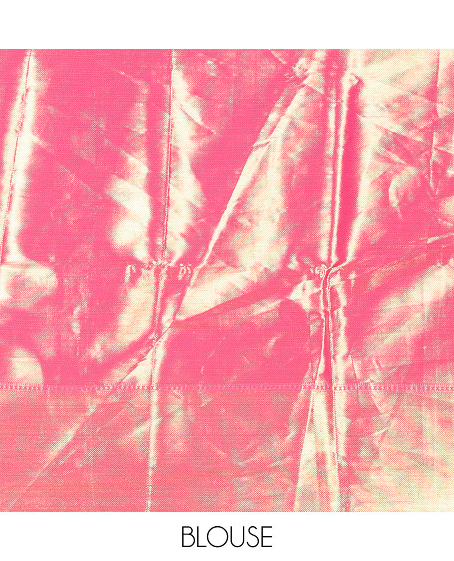 Pastel Pink Tissue Saree Features Floral Jacquard Design Woven All Over Its Body, Features a Contrast Gleaming Zari Traditional Design Border, Zari-Enriched Pallu, and a Matching Blouse