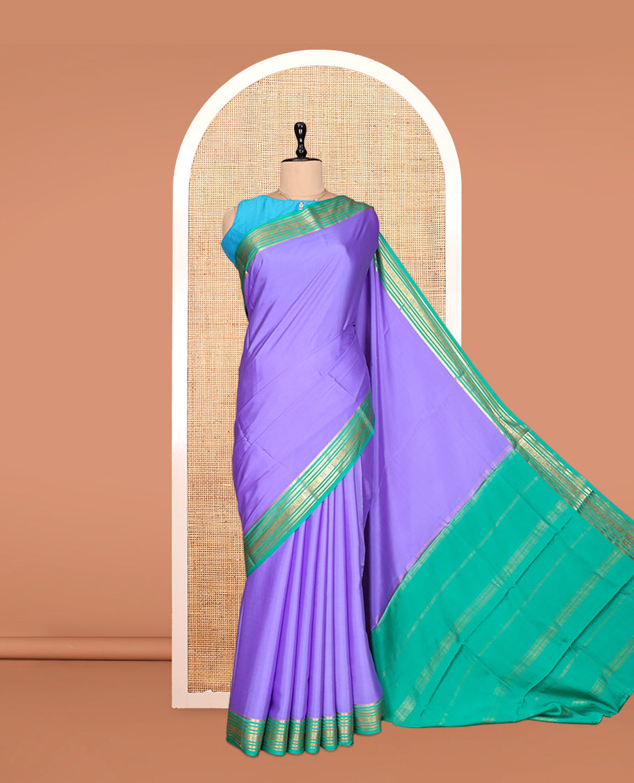 Lavender Plain Mysore Silk Saree, Complemented by a Contrast Traditional Zari Border, Zari Striped Pallu, and a Contrast Blouse