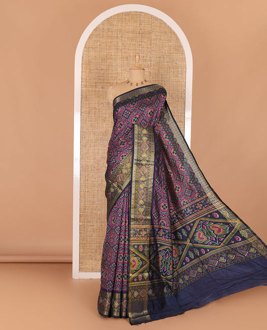 Navy blue intricate design patola saree, contrast traditional zari and double-ikkat style border, printed pallu, and blouse of print, and zari work