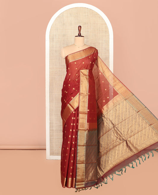 Rust Silk Cotton Saree, Highlighted by Zari Buttas On Its Body, Highlighted by Traditional Zari Border, Contrast Diagonally Woven Pallu and Paired with a Contrast Blouse
