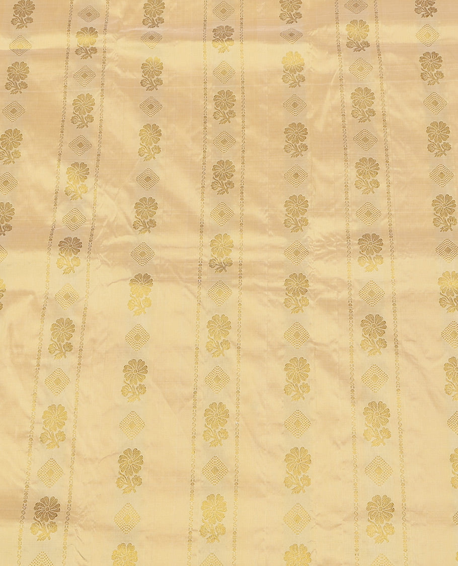 Gold Pure Silk Half-Saree, Spotlighted with Zari Buttas All Over Its Skirt, Complemented by Contrast Border of Jaal and Chakram Designs, Paired with a Contrast Blouse, and Comes with a Floral Design Dhavani