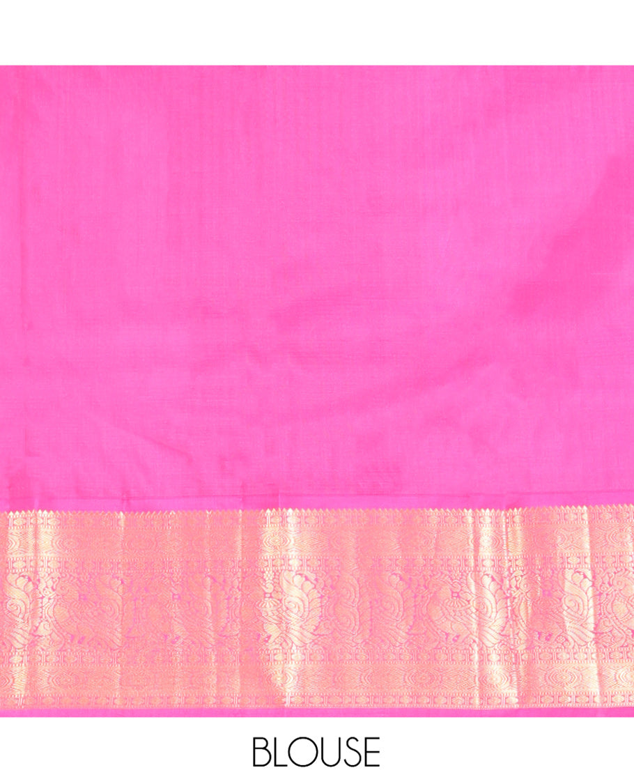 Yellow Vasundhara Silk Saree, Detailed with Zari Buttas and Stripes All Over Its Body, Complemented by a Contrast Border of Rekku, Muthu, Poun, Chakram, and Mayil Designs, Grand Manga Design Pallu, and Paired with a Contrast Blouse