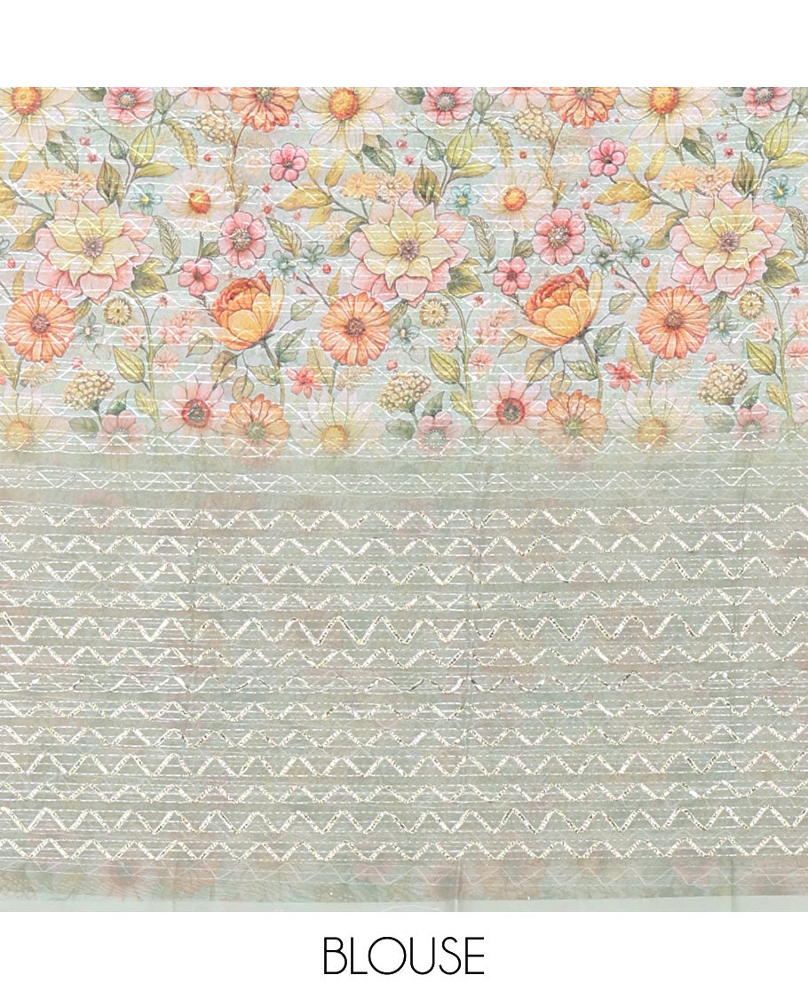 Borderless pista green sparkling glittered russel net saree, self-pallu and a floral print with zig-zag embroidered blouse