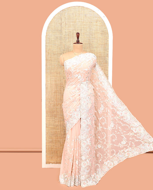 Peach Designer Saree, Impeccably Styled with Floral-Paisley Embroidery, a Scallop Heavy Embroidered Border, and a Matching Blouse