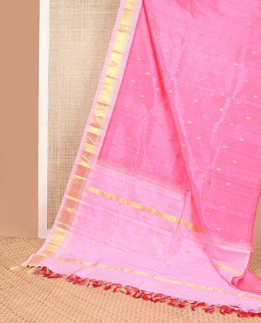 Baby pink buttas kancheepuram silk saree with contrast border of thilakam mokku, banras, checked design & zari design pallu