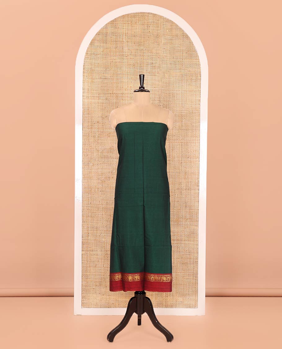 Green Plain Mercerised Cotton Material Churidar Set, Complemented by Contrast Elephant Motifs Woven Zari Border, Comes with a Plain Mercerised Cotton Bottom, and Is Paired with a Matching Mercerised Cotton Dupatta Mirroring the Same Design
