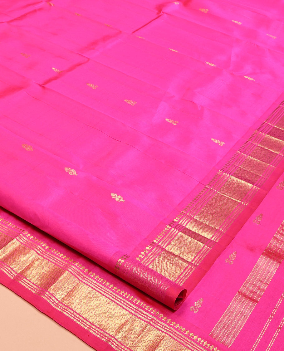 Pink Kanchipuram Silk Saree, Graced with Zari Buttas, Highlighted by a One-Sided Border of Panner Sombu, Banaras, Muthu, and Jaal Designs, Grand Pallu, and No Blouse