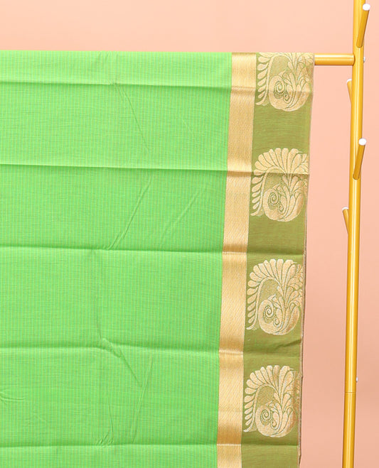 Green Semi-Silk Cotton Saree, Subtly Sparkled with Stripes All Over Its Body, Complemented by a Contrast Zari Buttas Woven Border, Pallu of Bird and Paisley Designs, and Paired with a Matching Blouse