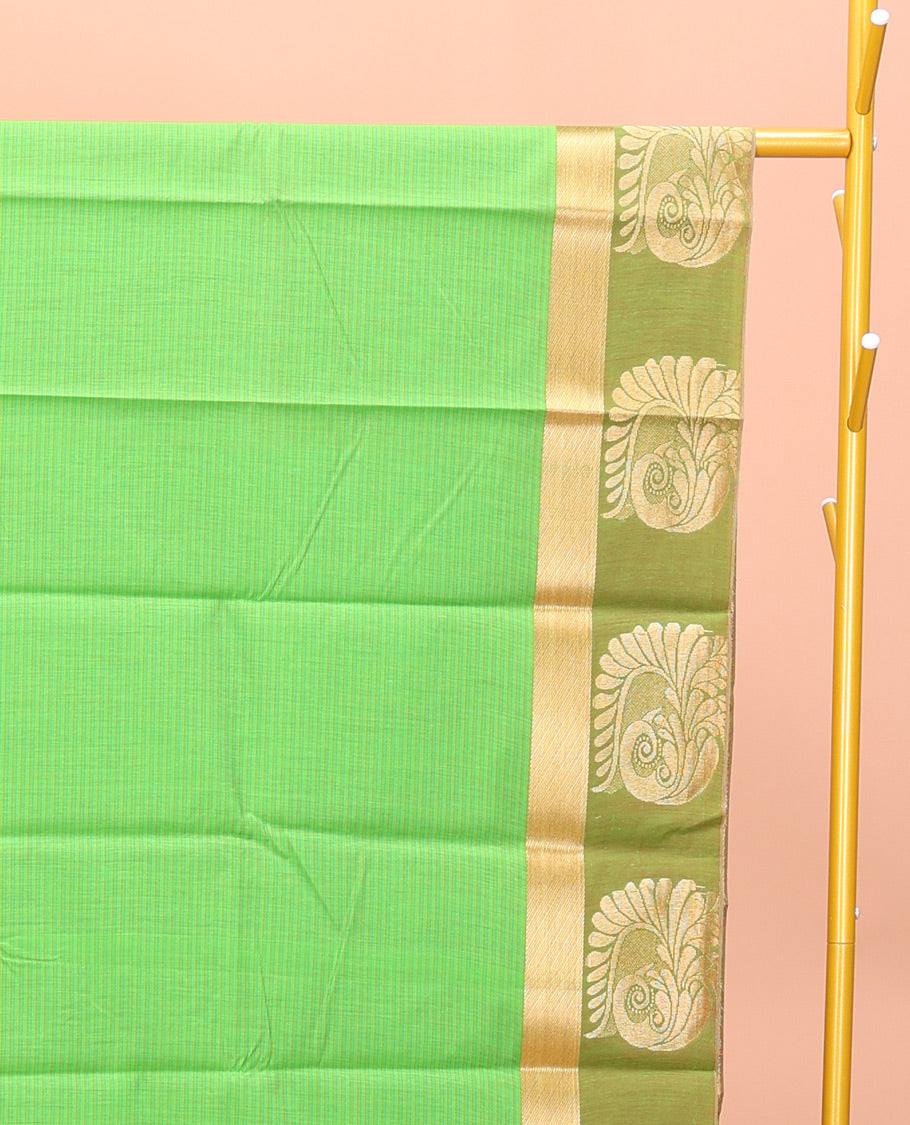 Green Semi-Silk Cotton Saree, Subtly Sparkled with Stripes All Over Its Body, Complemented by a Contrast Zari Buttas Woven Border, Pallu of Bird and Paisley Designs, and Paired with a Matching Blouse
