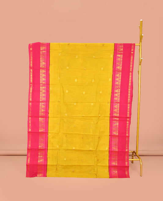 Mustard Sungudi Cotton Saree, Decorated with Zari Buttas on Its Body, Complemented by a Contrast Retttai Pettu Traditional Zari Design Border, Zari-Design Pallu, and Paired with a Contrast Blouse