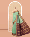 Green Kalyani Cotton Saree, Woven with Thread Buttas, Complemented by a Contrast Traditional Border, Traditional Pallu, and a Contrast Blouse