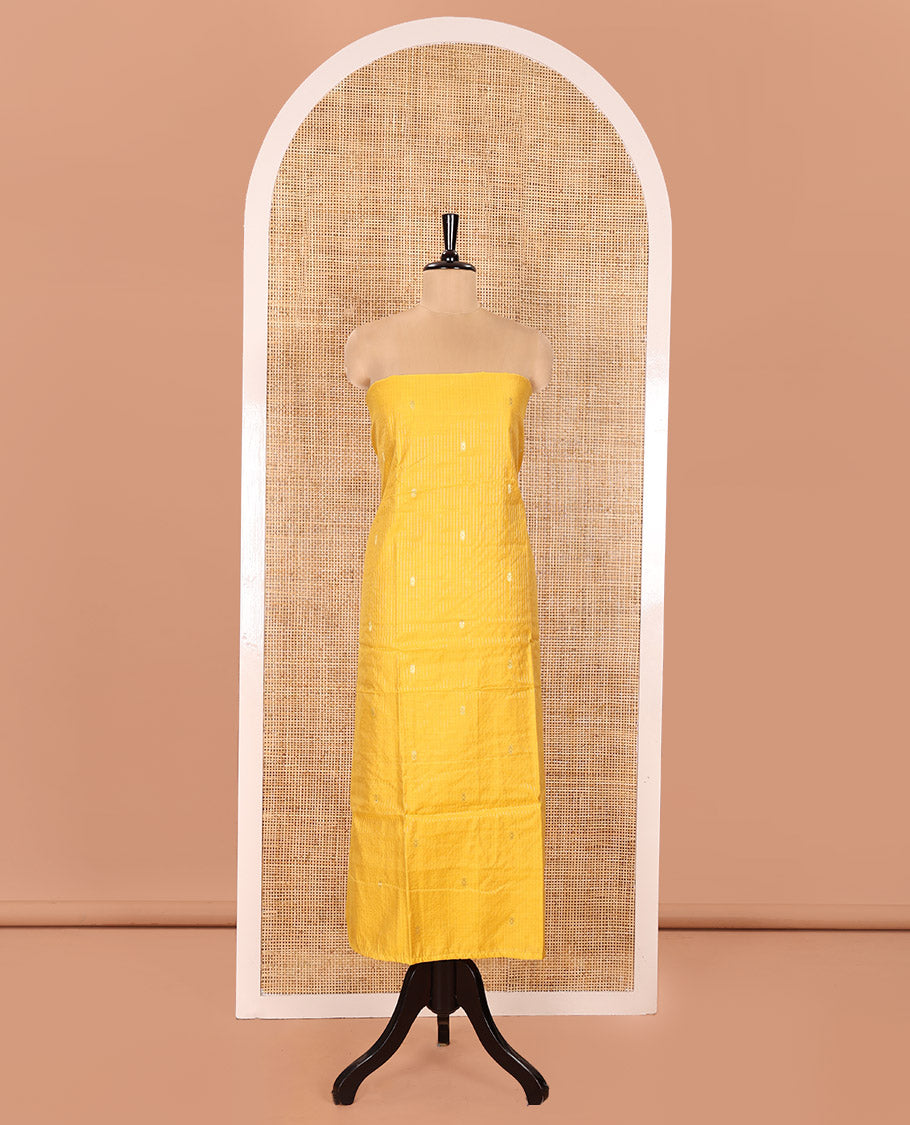Yellow Material Chudidhar Set, Delicately Woven with Dotted Stripes and Buttas on Its Semi-Silk Top, Plain Cotton Bottom, and Semi-Silk Dupatta Illustrating Pichwai Cow and Floral Print