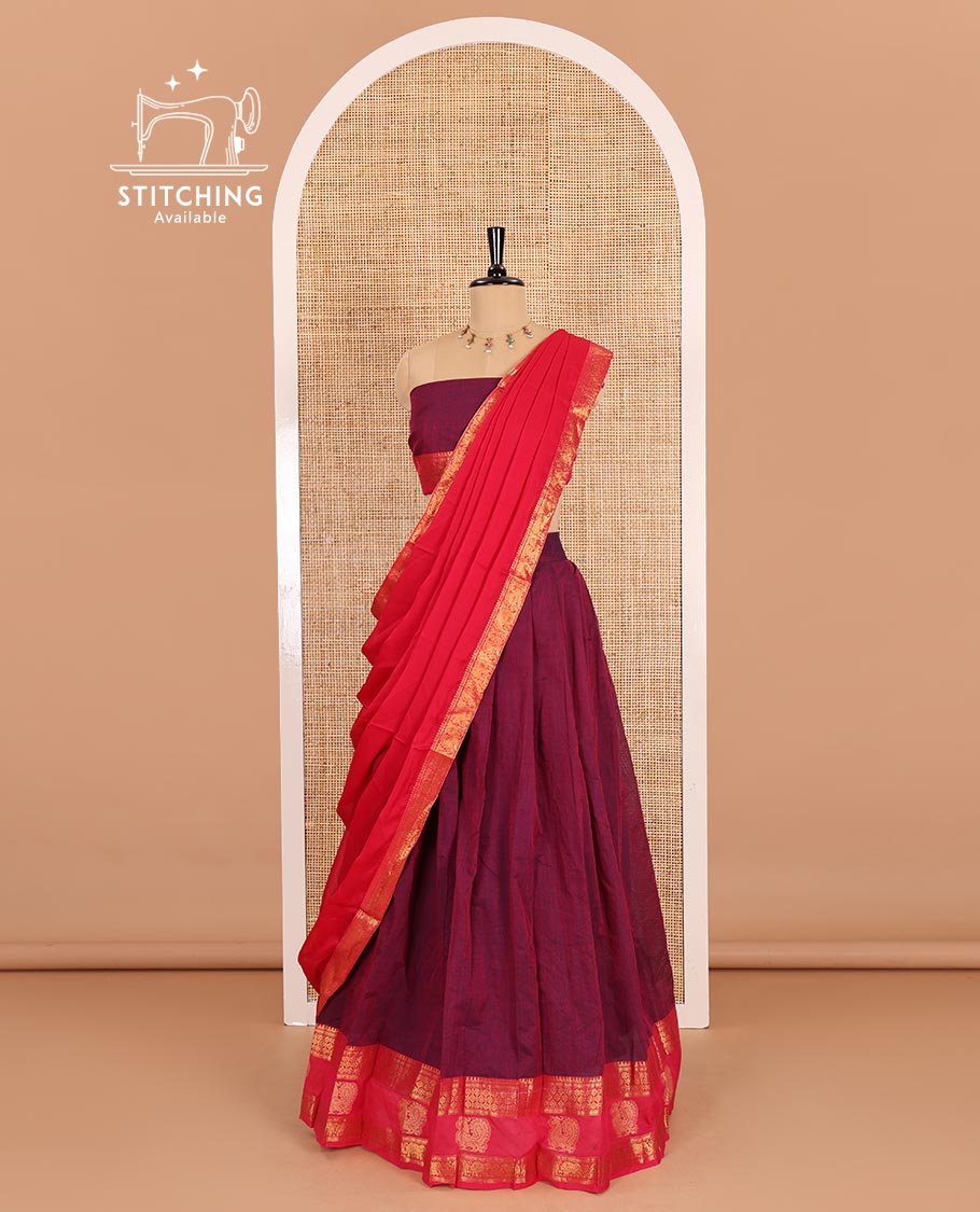 Majenta-rani pink sungudi cotton half-saree, plain with contrast traditional zari peacock motif bordered skirt, matching blouse, and a zari bordered dhavani
