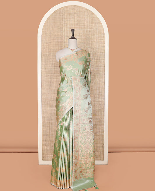 Green floral creeper design with stone work banarasi silk saree, floral creeper design border, and pallu of intricate designs with stone work