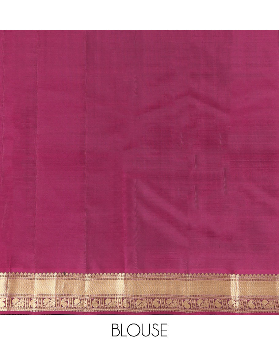 Green Kanchipuram Silk Saree, Gracefully Embellished with Zari Buttas All Over Its Body, Complemented by a Contrast Border of Manga and Mayil Designs, Grand Jaal Pallu, and Paired with a Contrast Blouse